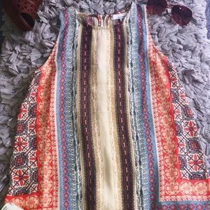 Colorful zip up sleeveless blouse
